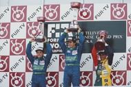 Aguri Suzuki (right) claimed his and Larrousse's only F1 podium in 1990.
